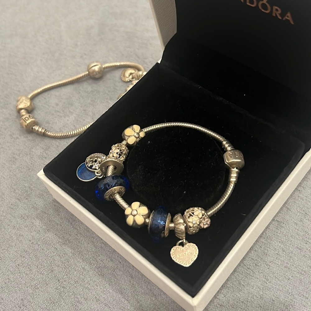 100% Authentic Pandora Bracelet with Charms and Dangles.